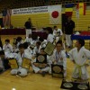 T. Holding Up Awards